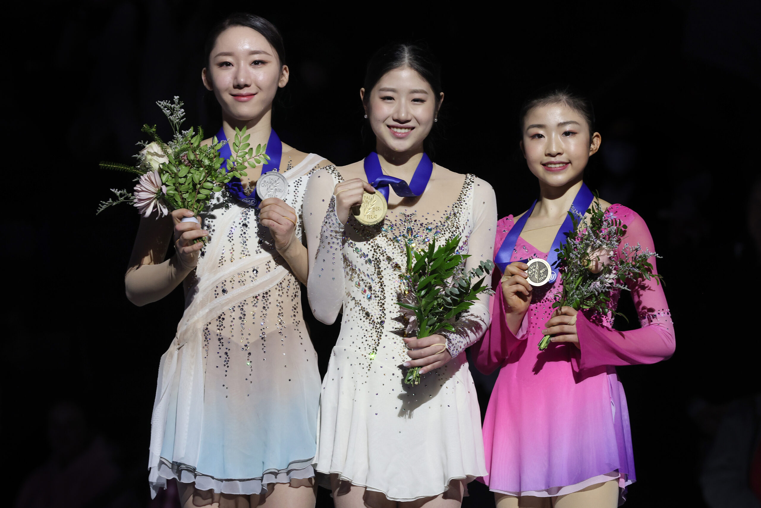 COLORADO SPRINGS, COLORADO - FEBRUARY 10: Yelim Kim of Korea, Haein Lee of Korea, and Mone Chiba of Japan pose with their medals after the Women's Free Skate during the ISU Four Continents Figure Skating Championships at Broadmoor World Arena on February 10, 2023 in Colorado Springs, Colorado. (Photo by Matthew Stockman - International Skating Union/International Skating Union via Getty Images)